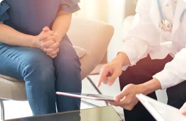 a person consulting primary care doctor for preventive screening